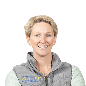 caring lovely happy middle aged redhead woman cross arms chest smiling joyfully talking lively discuss child grades school teacher grinning laughing have interesting conversation white wall